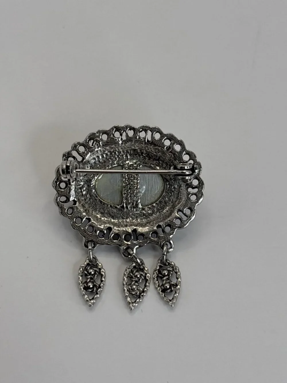 Silver Tone Oval Brooch Pin With Dangle Charms and Faux Pearl